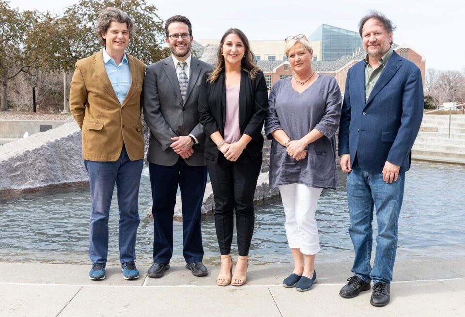 Speakers and organizer from 69th Nebraska Symposium on Motivation standing in front of water